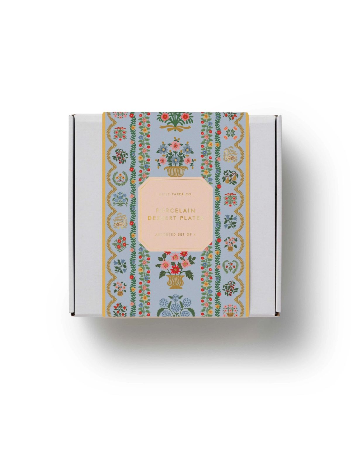 Decorative box with floral design and pink label on a white background