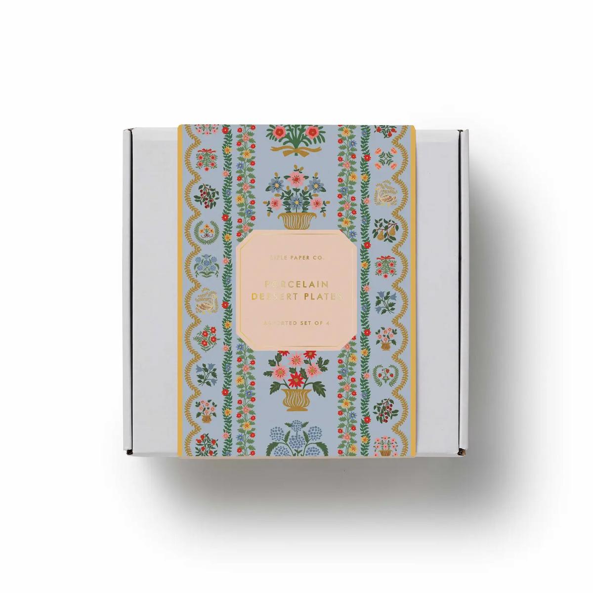 Decorative box with floral and geometric pattern on a white background