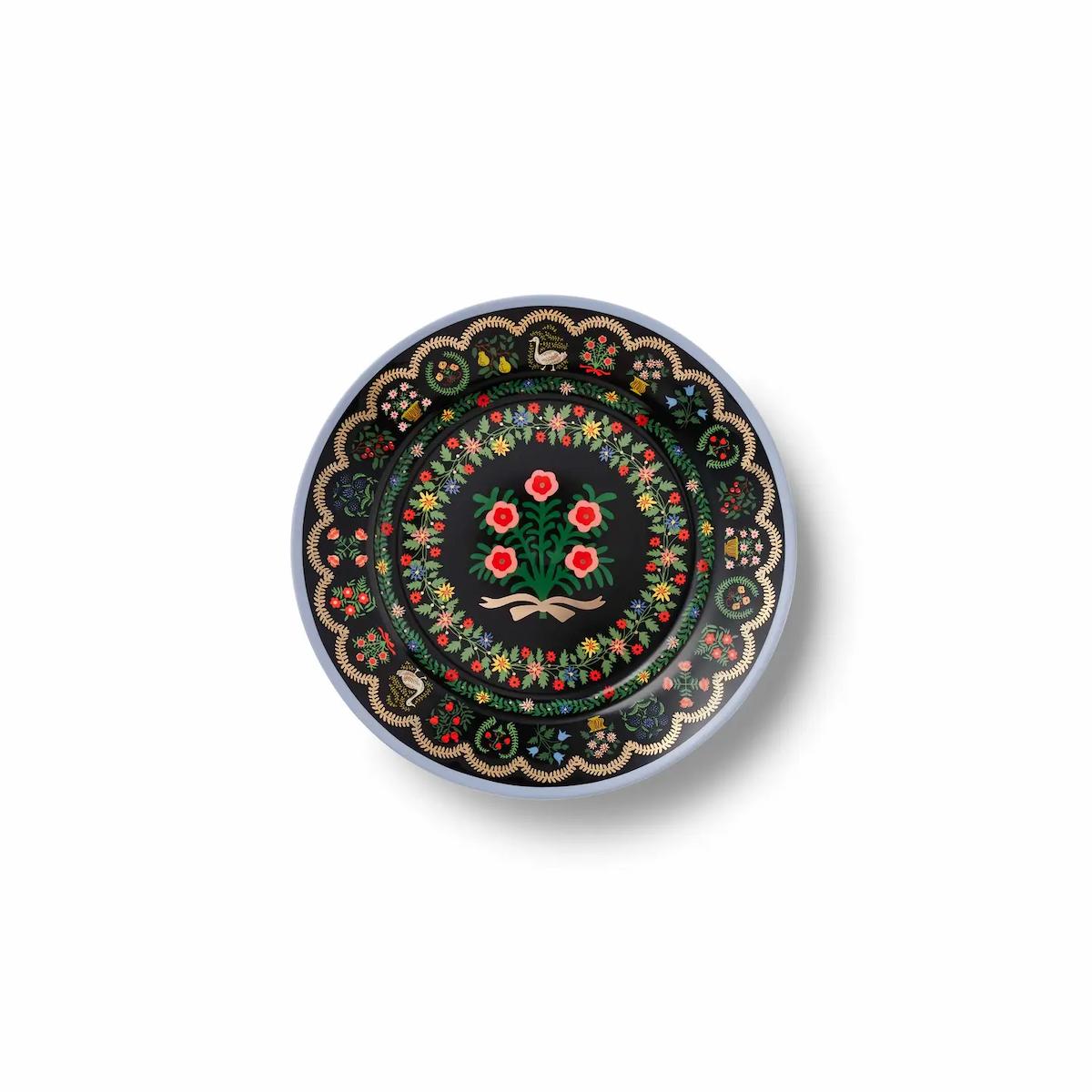 Decorative plate with floral design on a white background