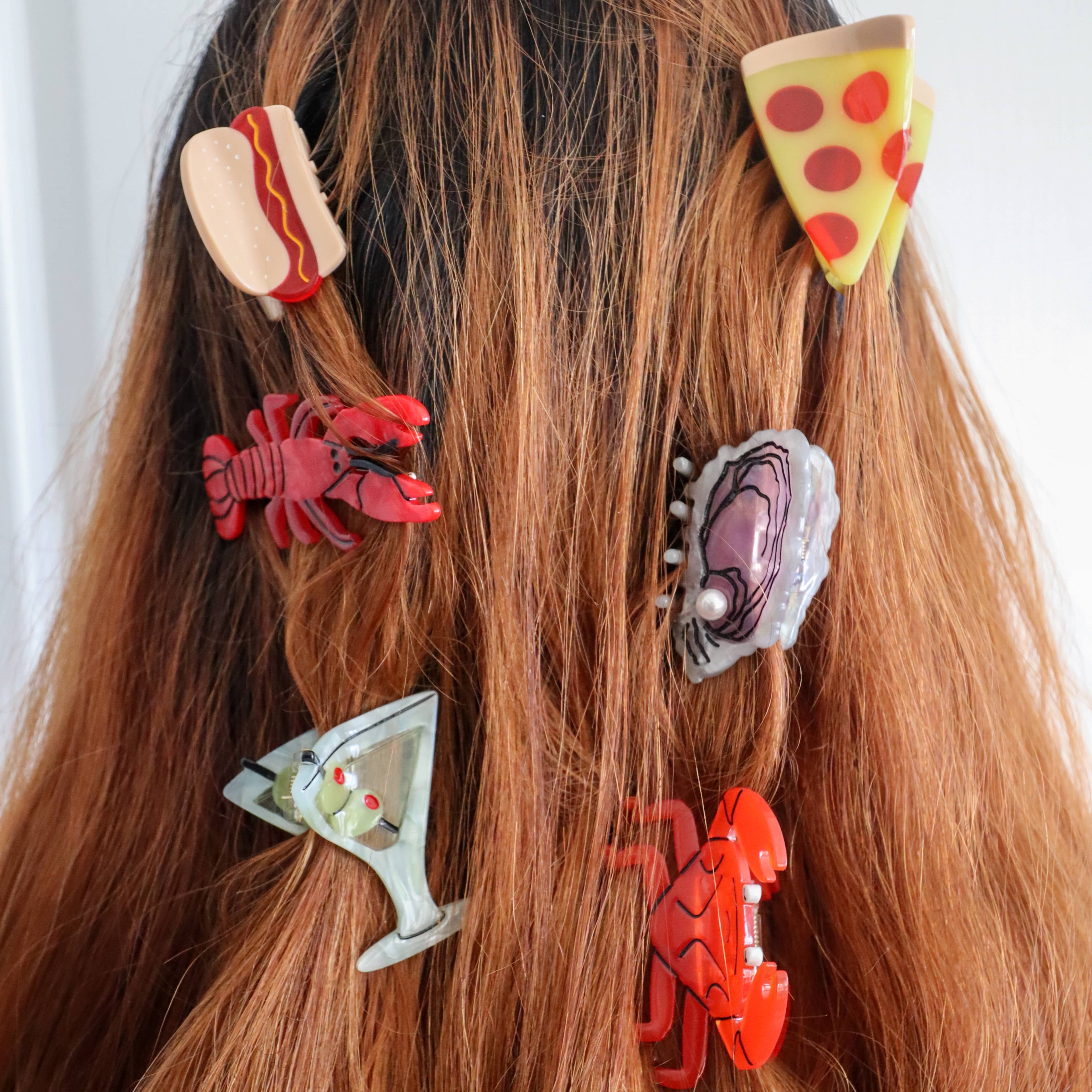 Hair accessories shaped like food items on a person's head