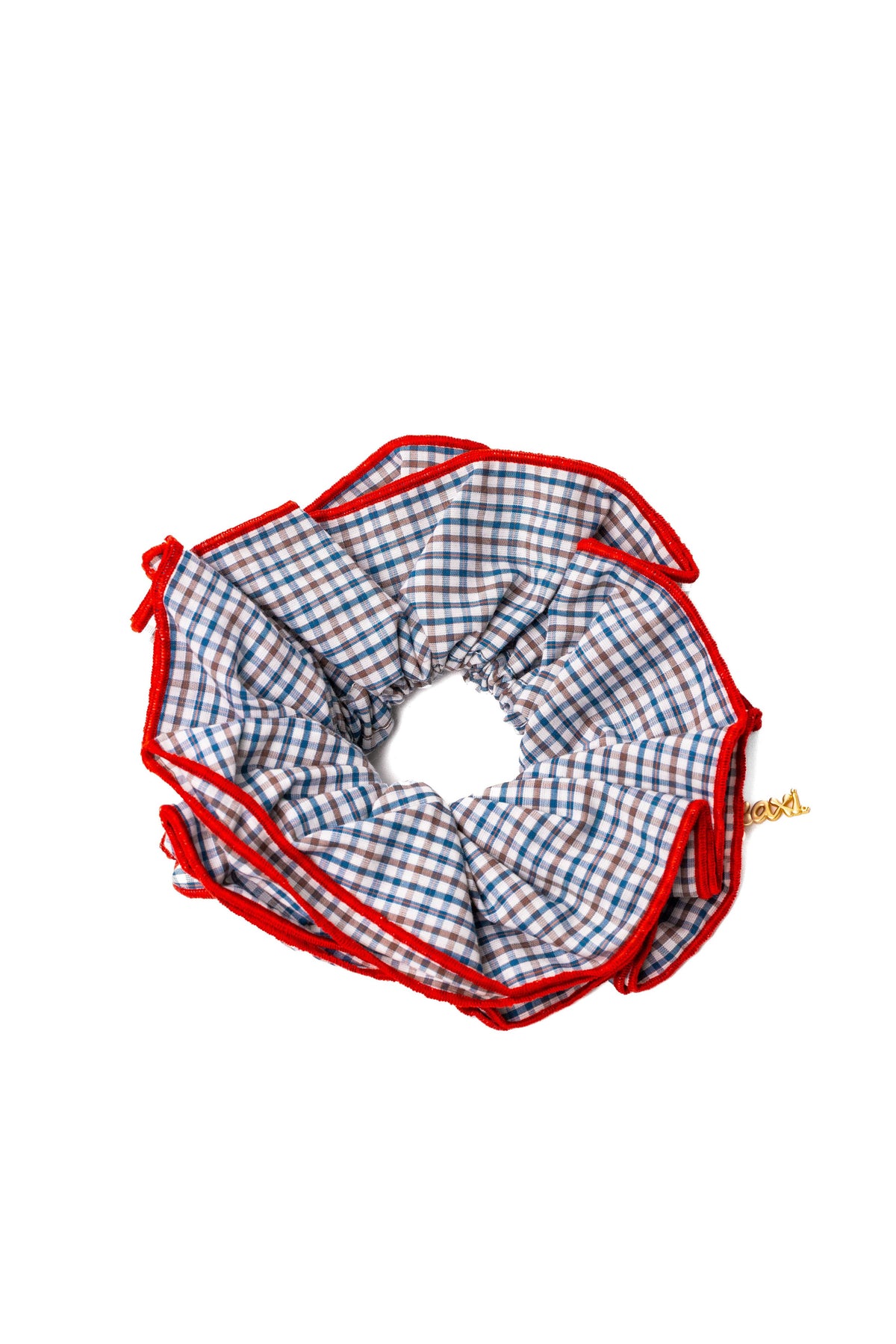 Checkered blue scrunchie with red border on a white background