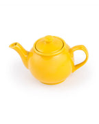 Yellow teapot on a white background