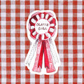 Decorative ribbon with 'Crafty Girl' text on a red and white checkered background