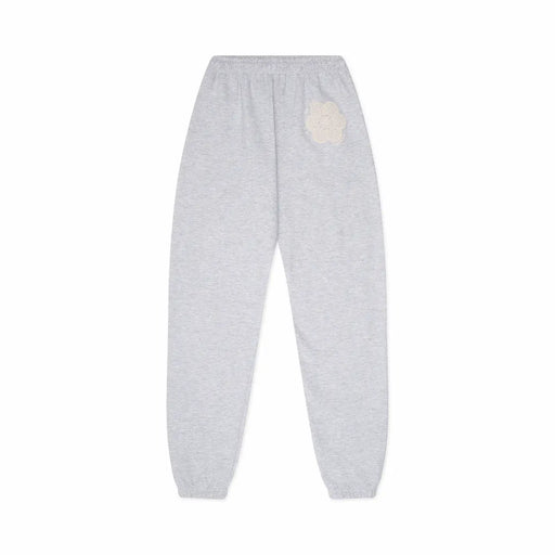 Gray sweatpants with a white doily design on a white background