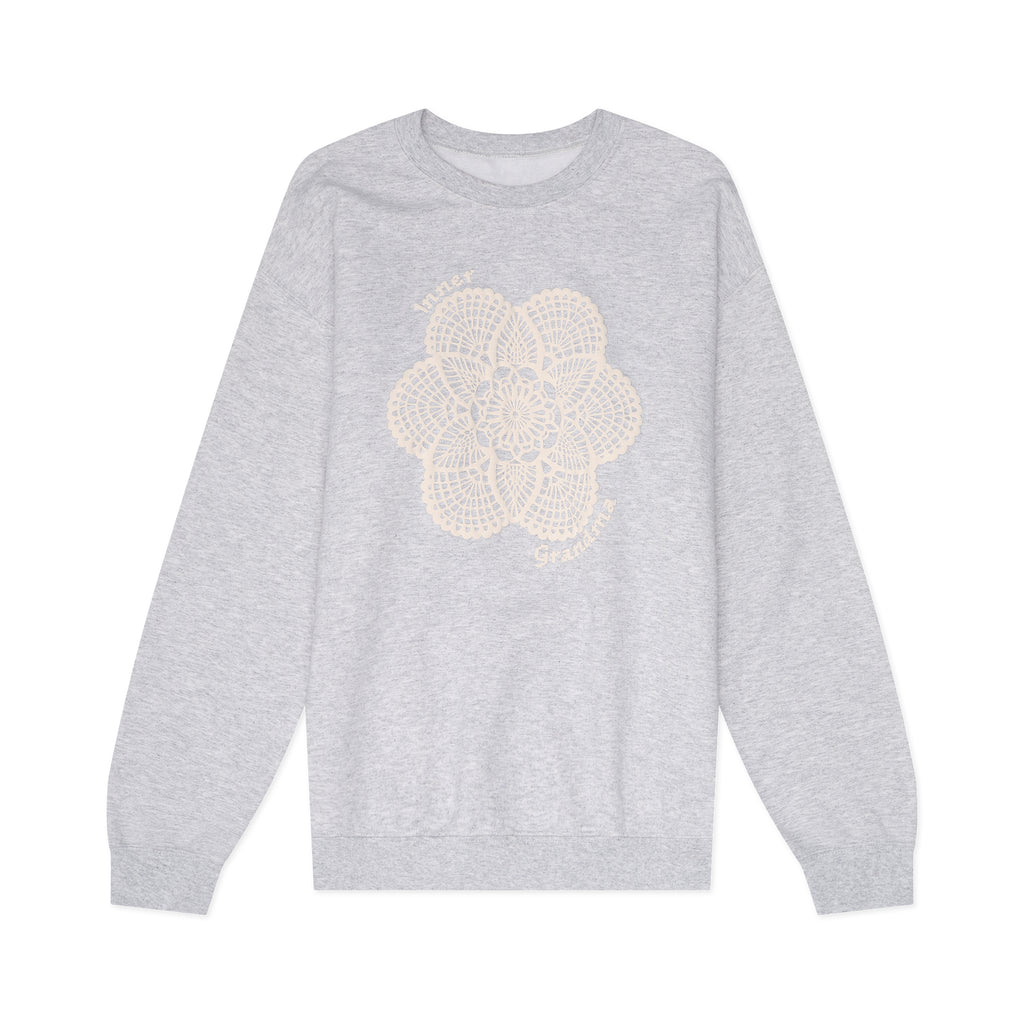 Gray sweatshirt on a white background with doily puff design on front