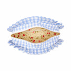 Blue and white gingham pouch with a floral interior on a white background