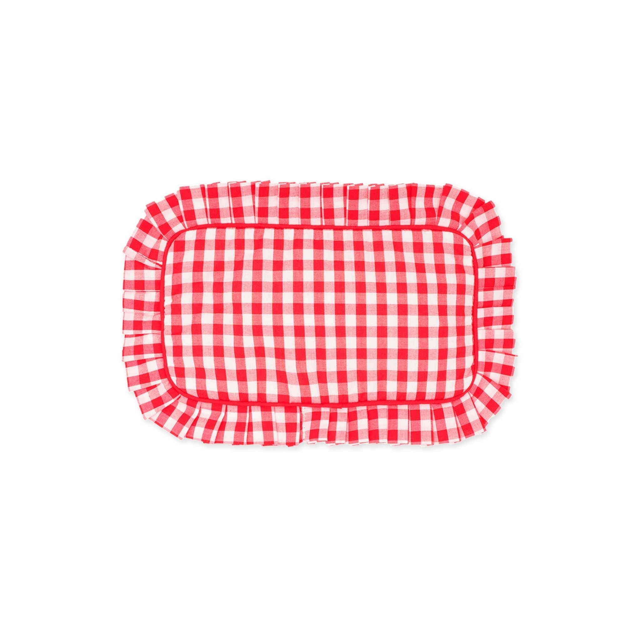 red and white gingham travel pouch on a white background