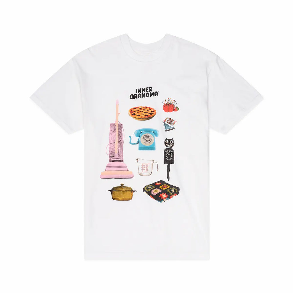 white t-shirt with retro graphic designs in a kitchen setting