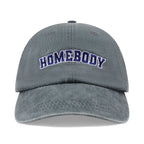Gray cap with 'HOMEBODY' text on a white background
