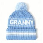 Blue and white winter beanie with pom on top and "GRANNY" across 