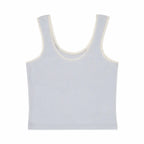 Light blue tank top with white trim on a white background