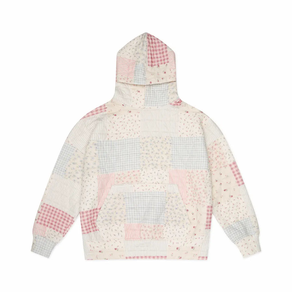 Patchwork hoodie with pink and gray and blue patterns on a white background