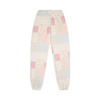 Checkered pants with pink and gray pattern on a white background