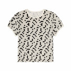 Black and white crossword patterned t-shirt on a white background