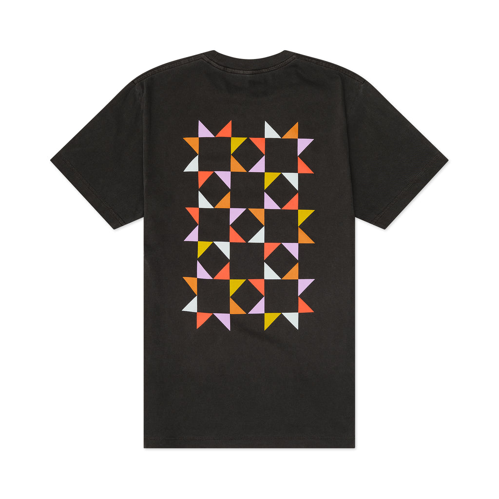 Back of black t-shirt with colorful geometric pattern on a white background