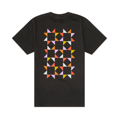 Back of black t-shirt with colorful geometric pattern on a white background
