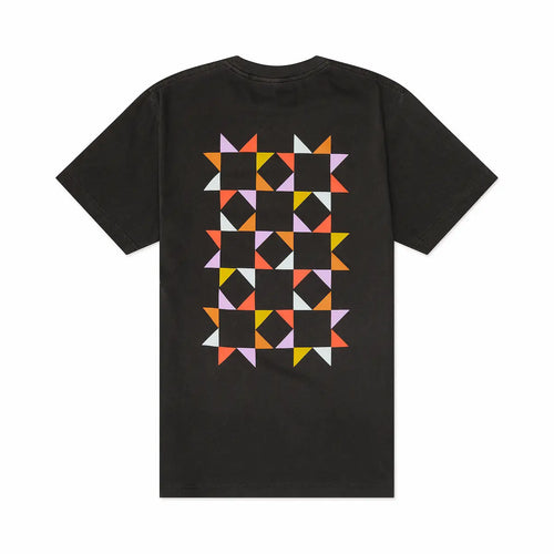 Back view of black t-shirt with colorful geometric  quilt pattern on a white background