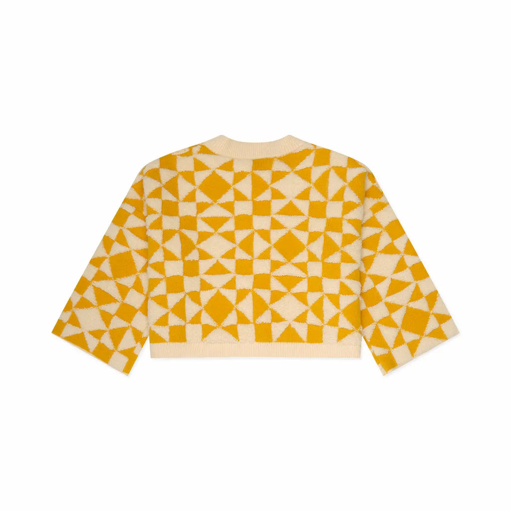 backview of Yellow and white geometric patterned shirt on a white background