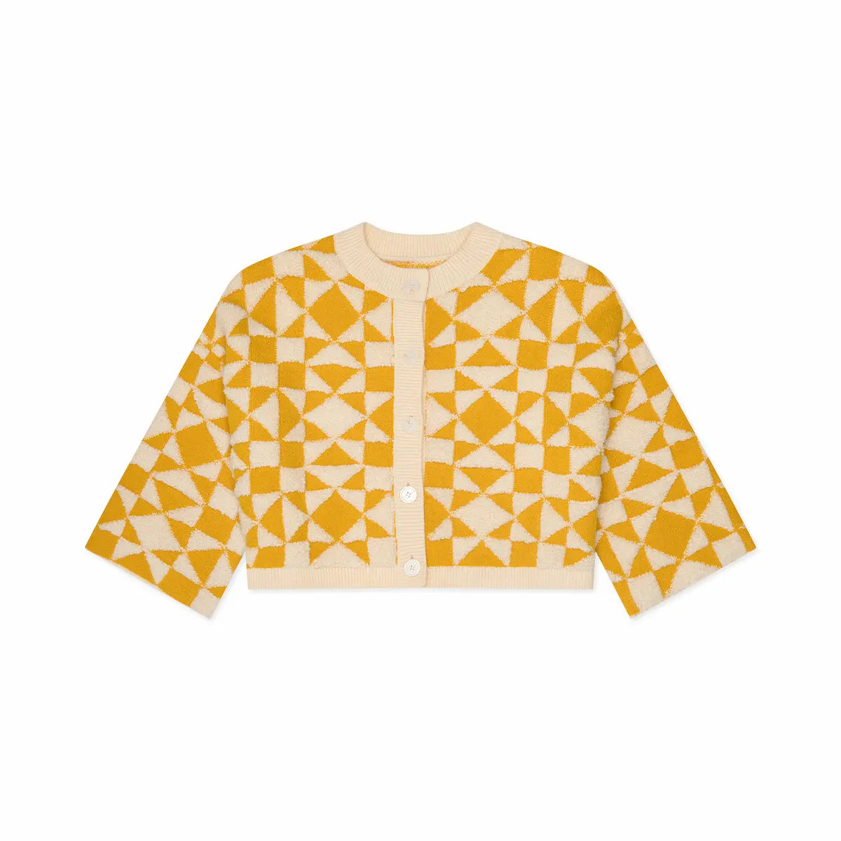 Yellow and white geometric patterned cardigan on a white background