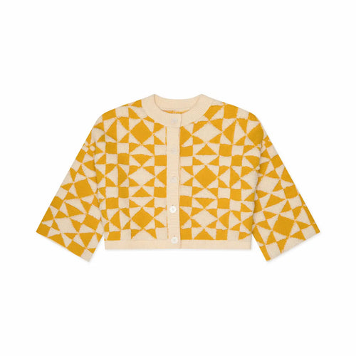 Yellow and white geometric patterned cardigan on a white background