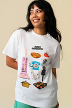 Person wearing a white t-shirt with colorful graphics of grandma's items on a beige background.