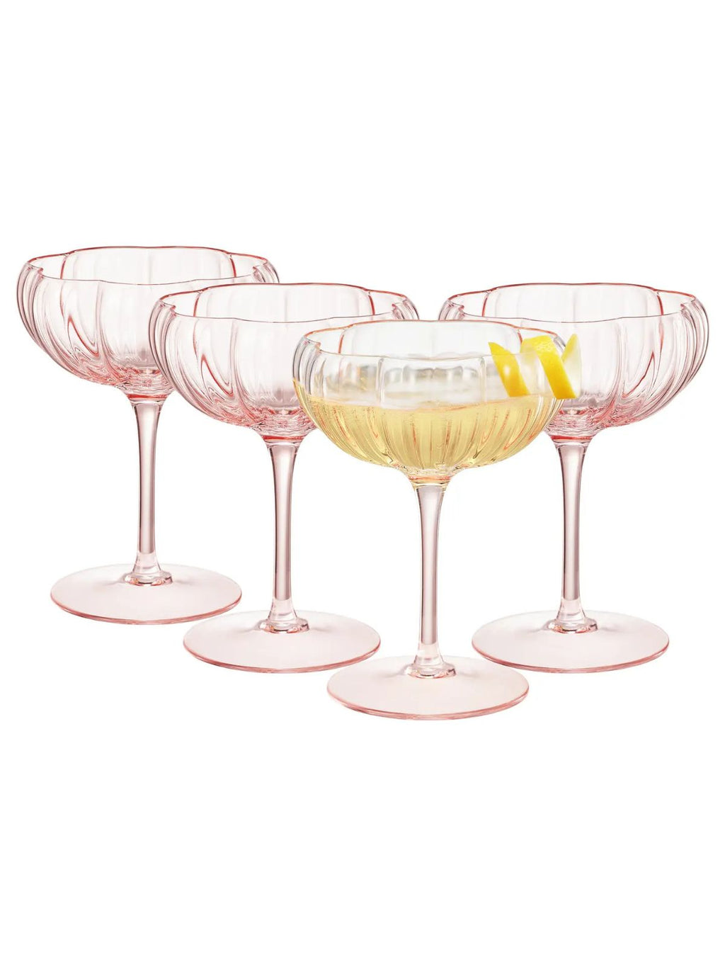 Set of four pink cocktail glasses with a drink inside on a white background