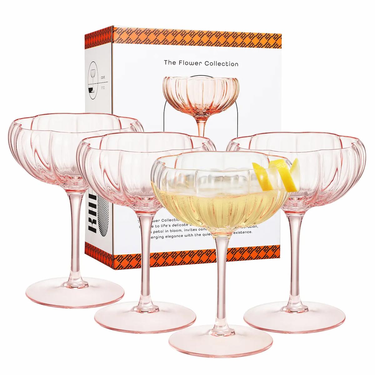 Set of pink champagne glasses with a box labeled 'The Flower Collection' on a white background.