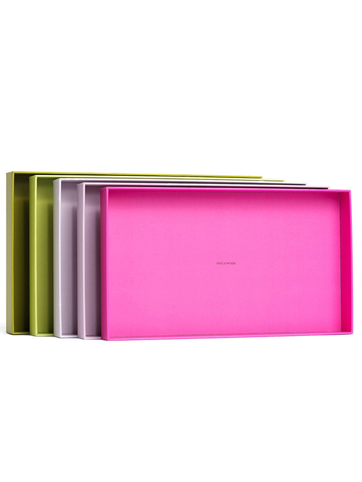 Set of colorful trays on a white background