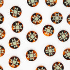 Pattern of tortoiseshell star-shaped buttons on a white background