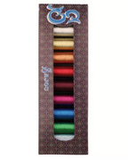 Set of colorful spools of thread in a decorative box with Sajou brand logo.