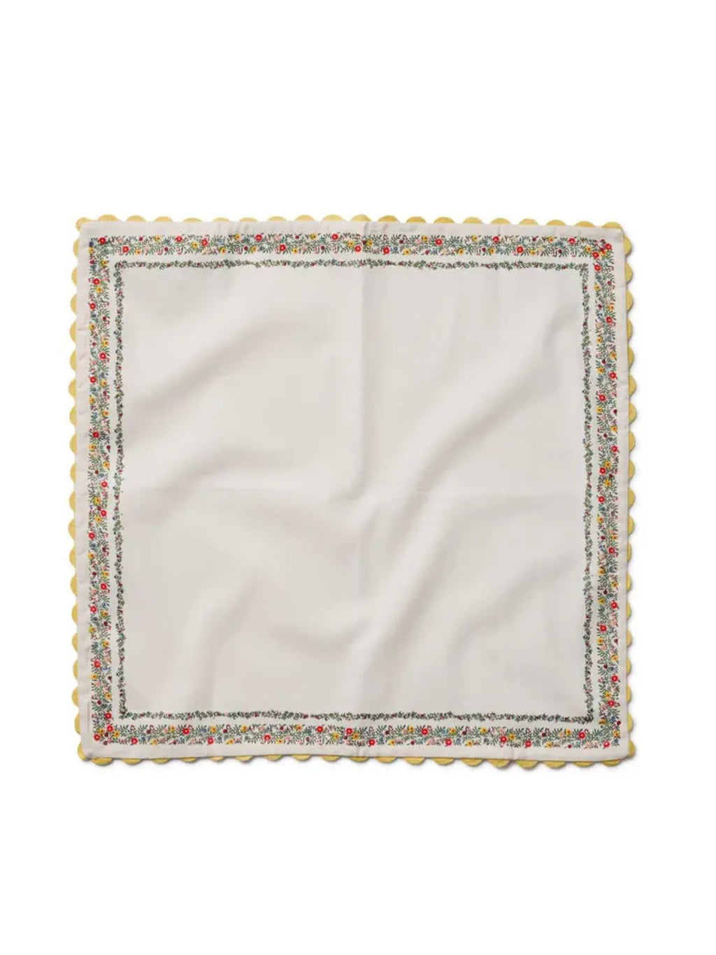 White napkin with colorful border on a white background