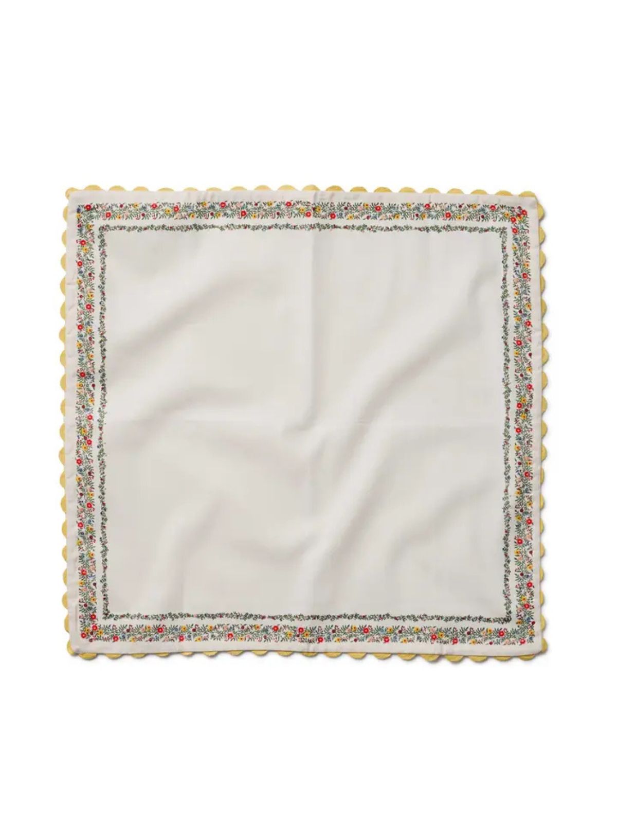 White napkin with colorful border on a white background