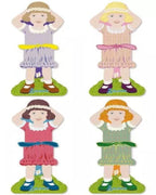 Four thread holders shaped like dolls with different dresses on a white background