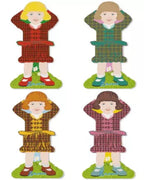 Four thread holders shaped like dolls with different dresses on a white background
