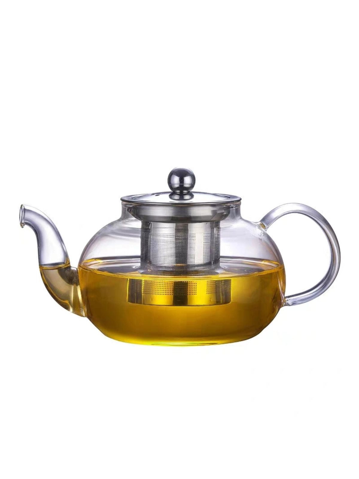 Clear glass teapot with metal lid and handle filled with tea on a white background