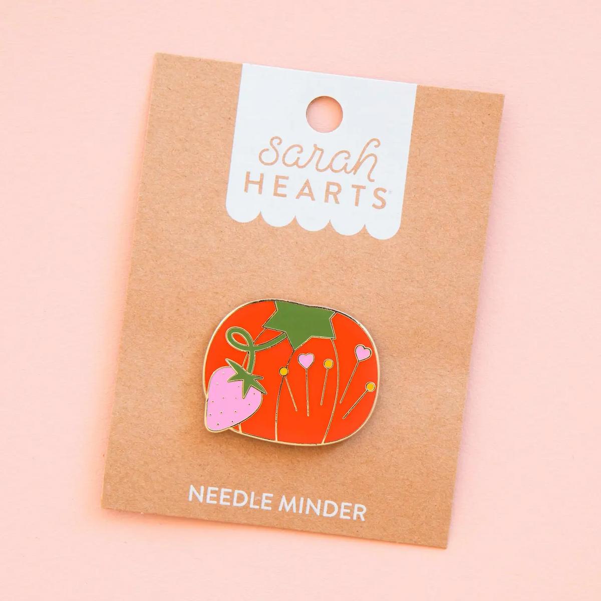 Pin with tomato design on a 'Sarah Hearts' branded card against a pink background