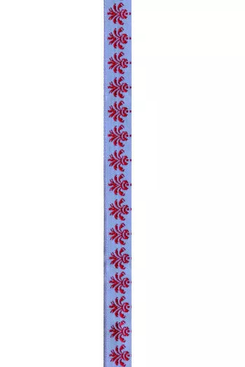 Decorative blue ribbon with red floral patterns on a white background